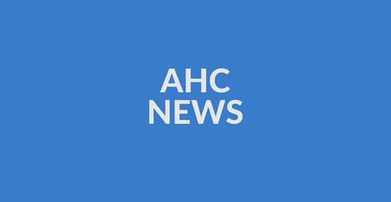 White text reading AHC NEWS is centered on a solid blue background.