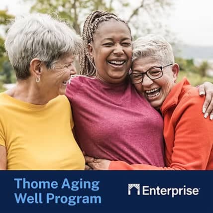 Three older women smiling and hugging outdoors, appearing happy and enjoying each others company. Text reads, Thome Aging Well Program and Enterprise—AHC Greater Baltimore Selected for 2022 Thome Aging Well Grant—with a logo.