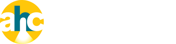 Logo for Affordable Homes & Communities, featuring the letters “ahc” in lowercase over a yellow circle, with “AFFORDABLE HOMES & COMMUNITIES” written in bold white text to the right.
